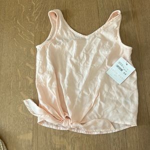 Knot on the front with a v-neck